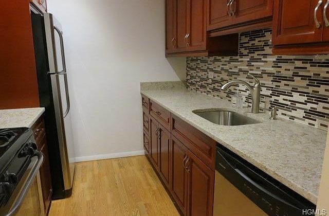 Brand new kitchen with stainless steel appliances