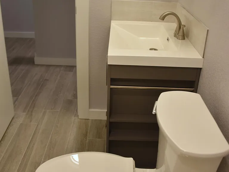 upstairs bathroom with door open