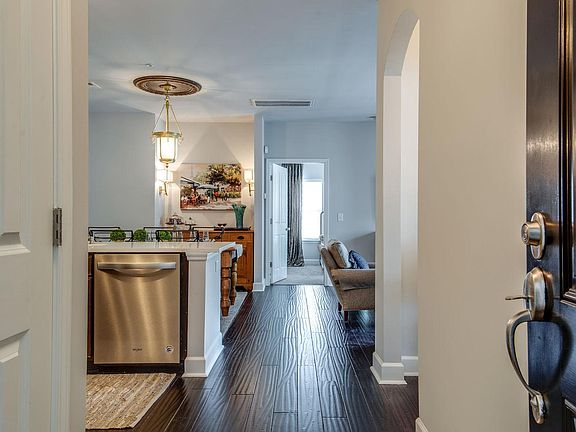 Foyer Entry to Condo freshly painted with Hardwood Floors