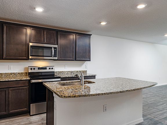 Beautiful granite countertops and other features are built right in