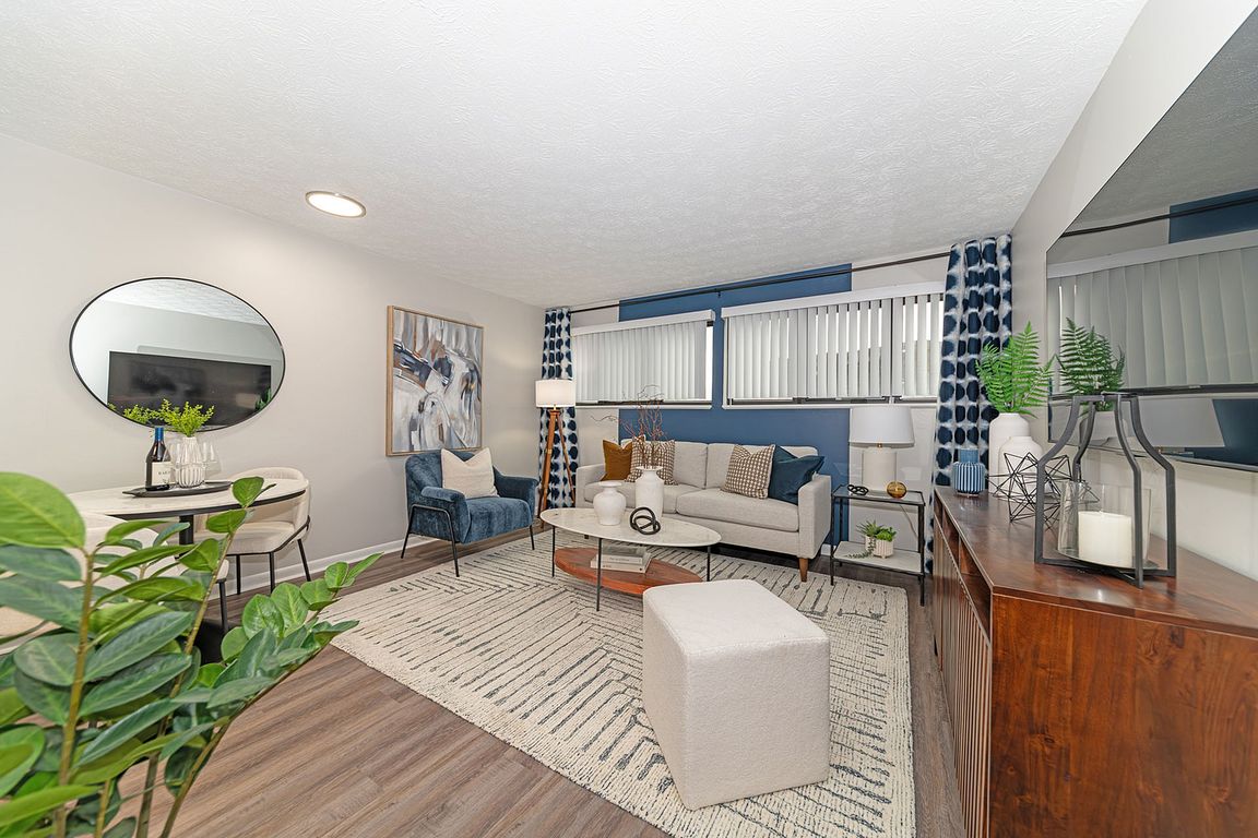 Spacious living room with hardwood-style flooring