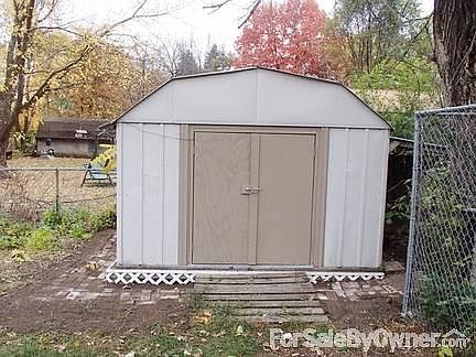 Steel Shed
						:
						Great for lawn tractor and yard tools.