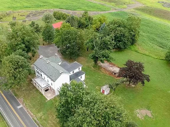 On two acres next to preserved farm land
