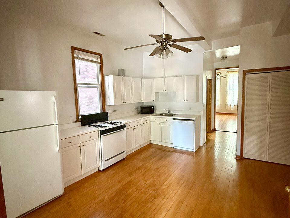 Kitchen with view of hallway
