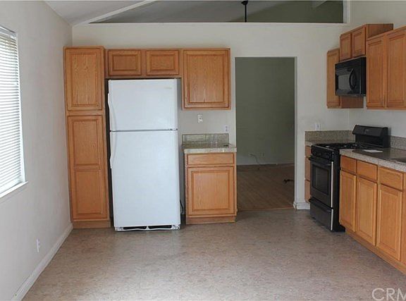 old photo, kitchen and whole house has been painted tan