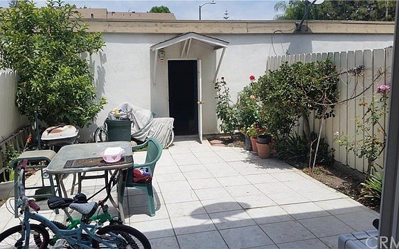 Tiled private rear yard/patio