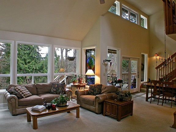 This picture shows the opposite side of the living and dining rooms with the sliding door leading to