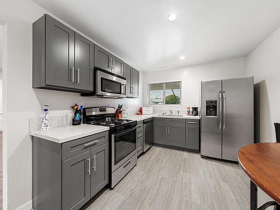 Kitchen - New cabinets and quartz countertops.