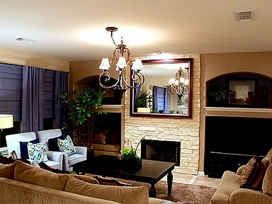 THIS LARGE LIVING SPACE IS A GRACIOUS COMBINATION OF COMFORT AND STYLE