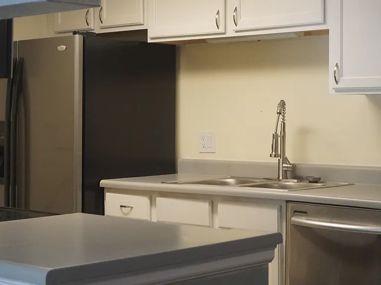 Functional and friendly kitchen off the living room.