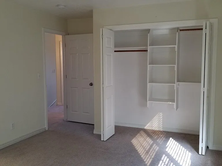 Closet in East bedroom on second floor. The west bedroom has similar closet, but is slightly bigger.
