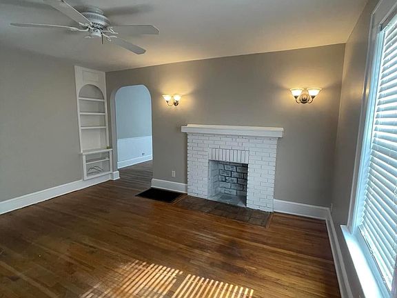 Living room with nice natural light from three windows (brand new blinds)
Fire place is a great feature but cannot be used for fires