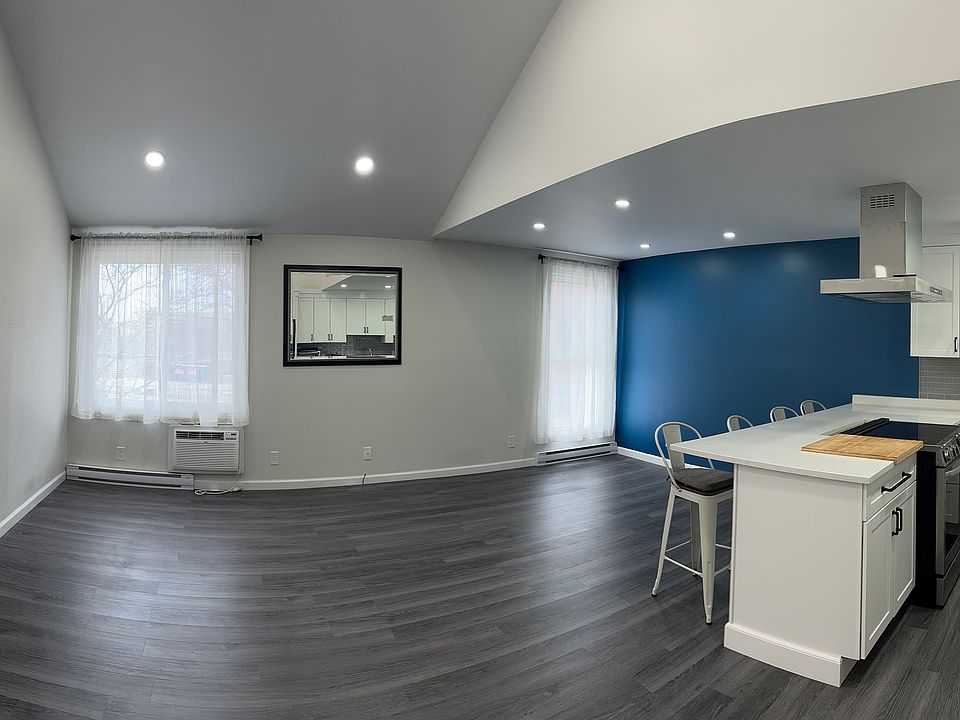 pano view of open floor plan and living room