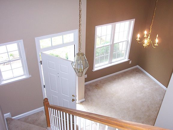 Two story foyer, formal dining room