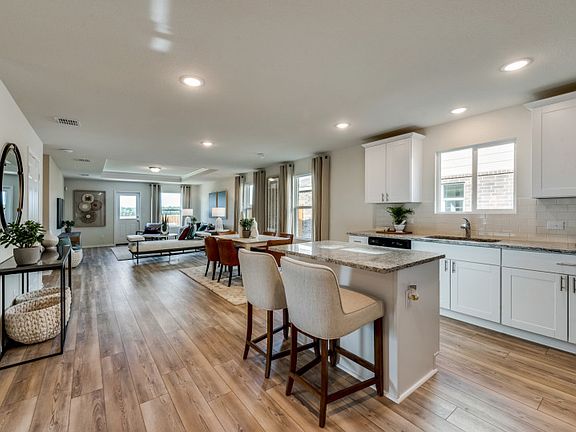 Open-concept throughout main living areas Model representation