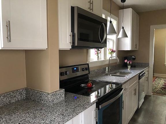 Stainless appliances and granite counter tops.