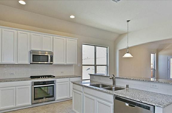 White Kitchen Cabinets and Large Island