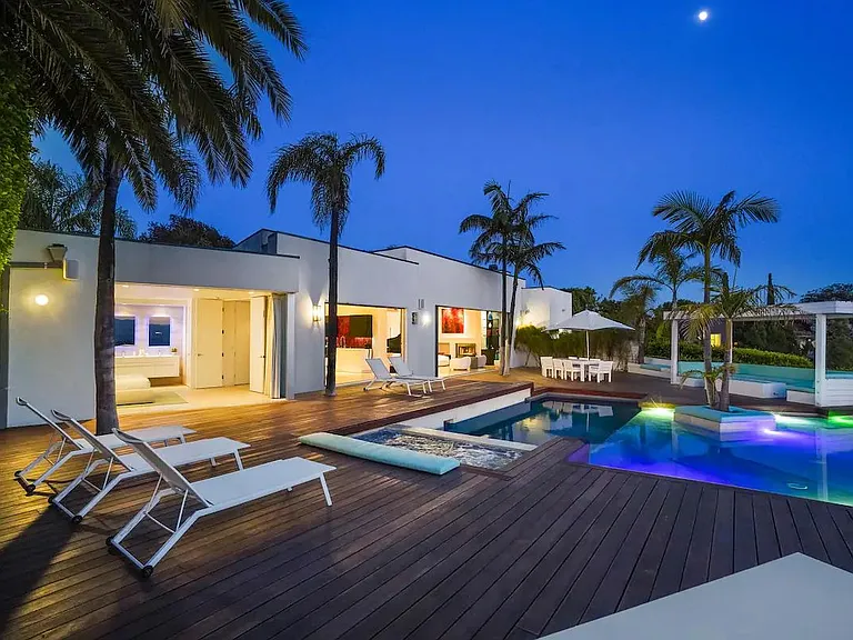 Experience the enchanting night sky by the pool, a perfect setting for stargazing and relaxation.