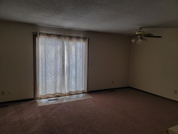 Living room with patio out to private deck