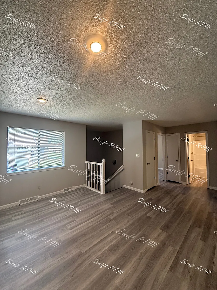 Building Photo - 12915 W 61st Ter #1