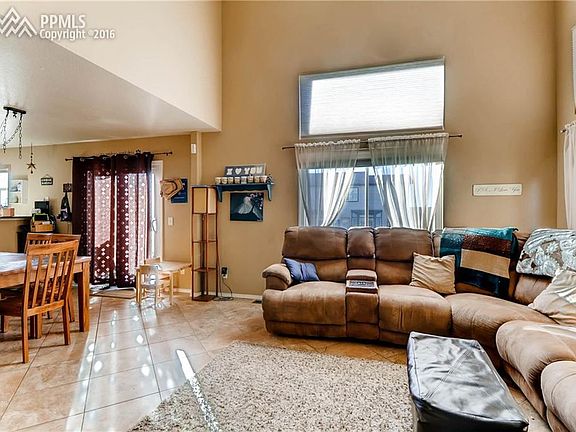 Open family room with high vaulted ceilings