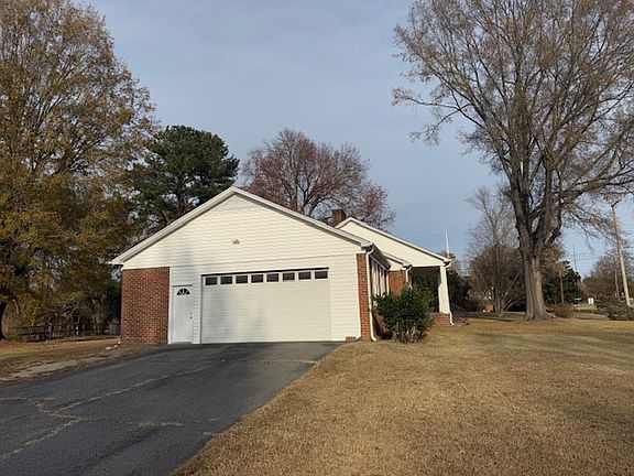 Two car garage. Side view of the house.