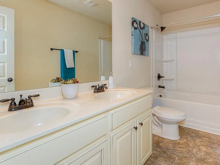Bathroom( Actual House has Cabinet stain)