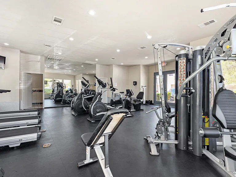 Large community gym, water fountain, and convenient bathrooms