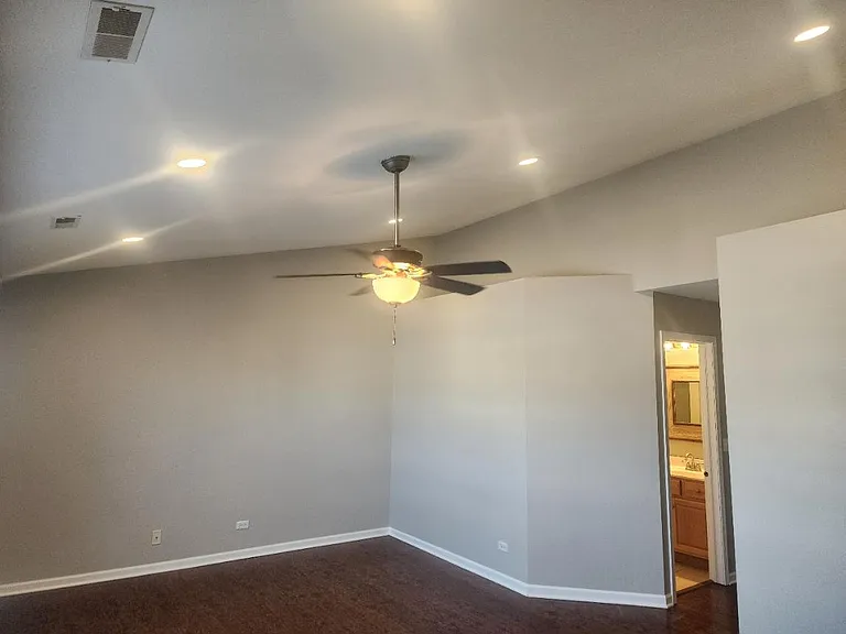 Master bedroom with updated recessed LED lights and ceiling cutout for decorations
