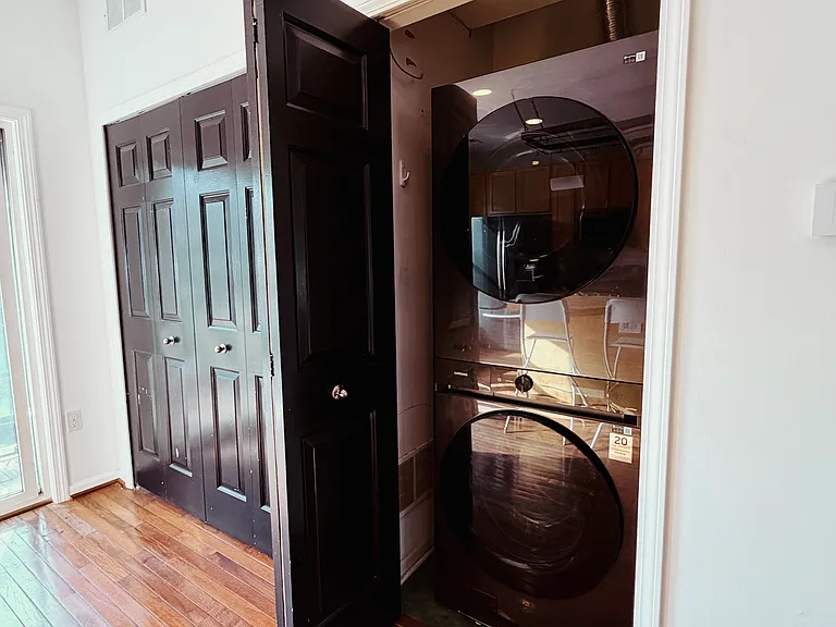 Stacked in-unit laundry with AI + auto soap dispensing