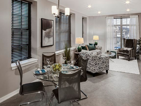 Spacious dining and living areas with abundant natural light.