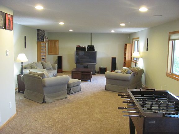 Lower level family room has radient heat and walks out to ba