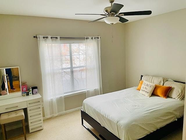 Bedroom with walk in closet