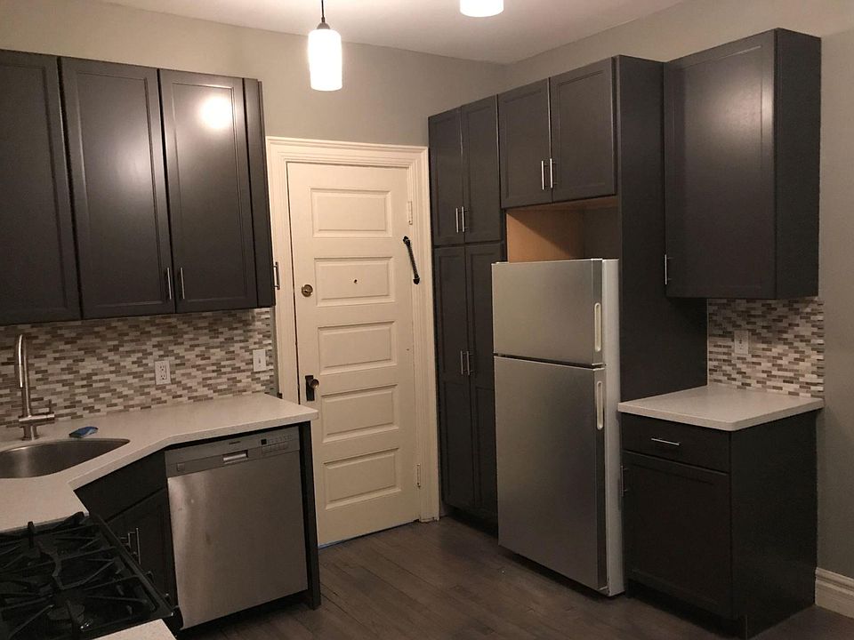 Kitchen - door goes to back hall/stairs to basement