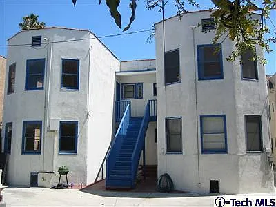 Rear of Building - Parking Area - 2 Parking Spaces with Unit
