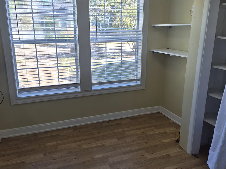 Dining area with pantry open.