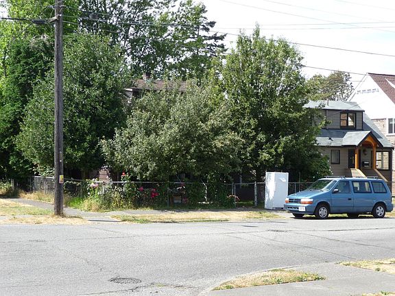 View from street w/ private surrounding tree's 
