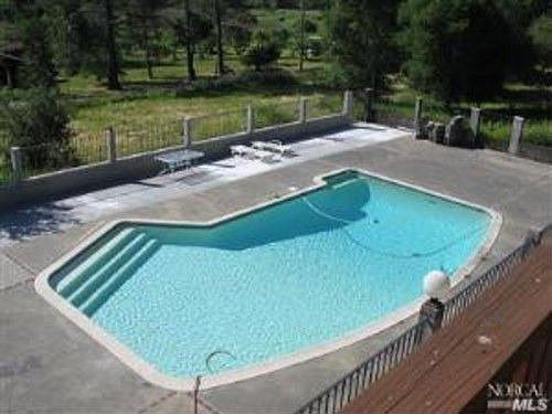 Large, 6' deep pool and patio area (fenced with locking gates)