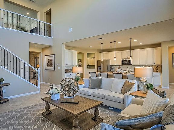 Entertain in the large gathering room that is open to the kitchen.