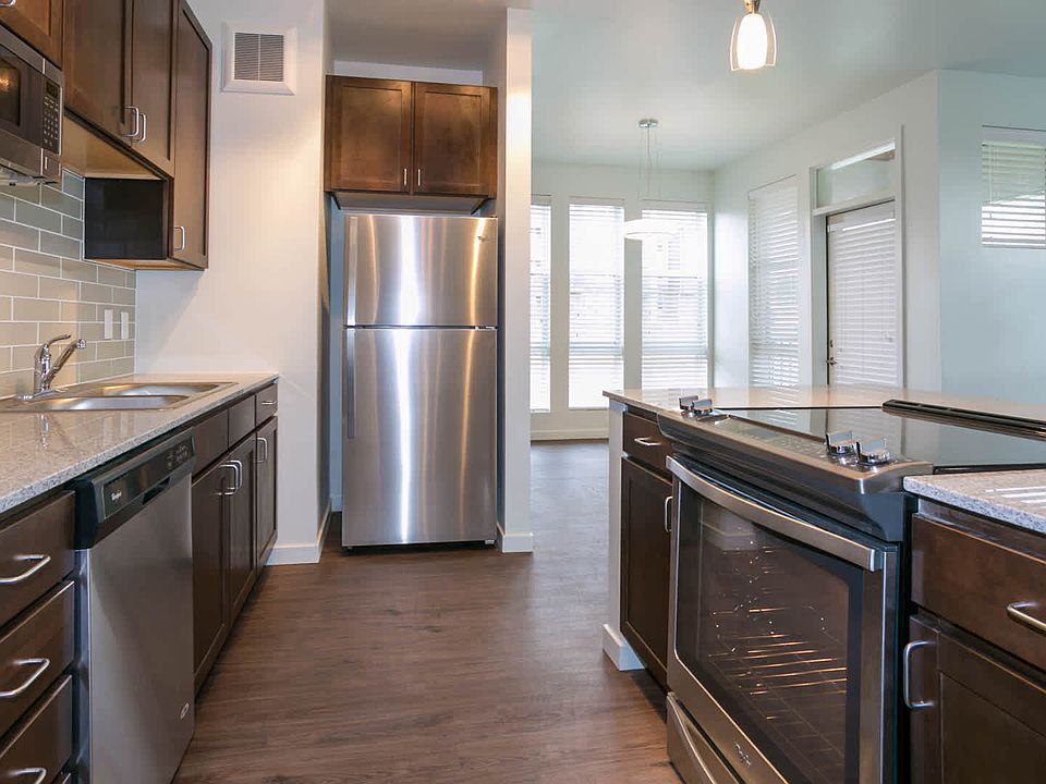Kitchen with Stainless Steel Appliances and Granite Countertops