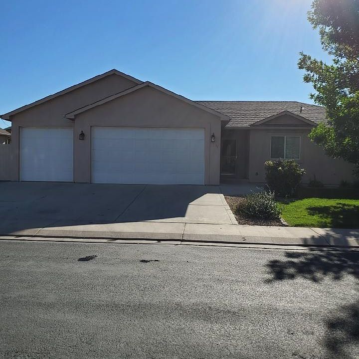 Front exterior of home with a hard-to-find 3-car attached garage