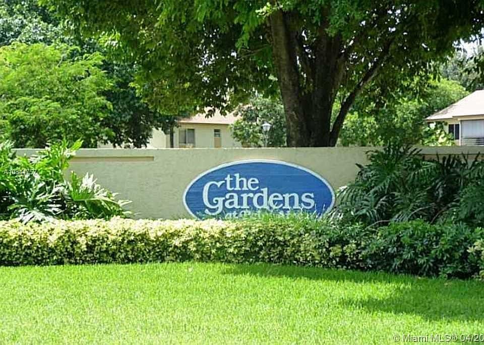 1st image of 303 Gardens Dr APT 205