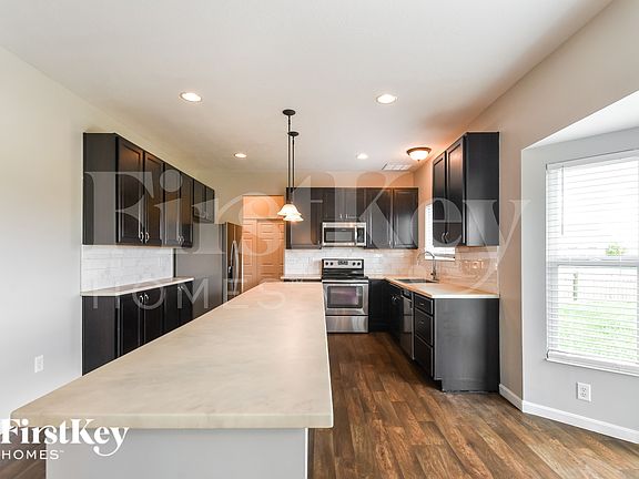5th image of 5593 W Woodhaven Dr