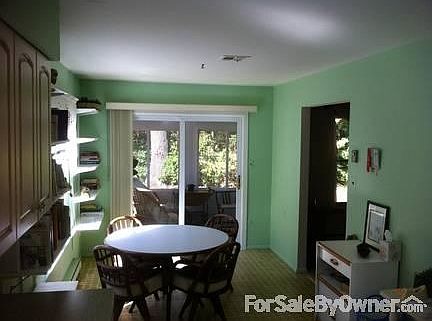 Eat-in kitchen
						:
						Sliding doors to attached three season room