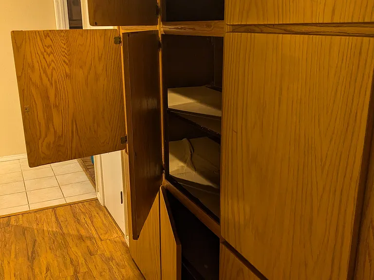 Reverse view of hallway showing storage space
