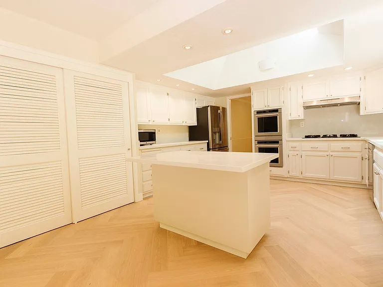 Pantry Closet behind white closet doors