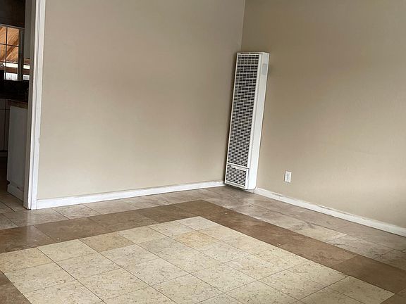 Living room, pictured from entry