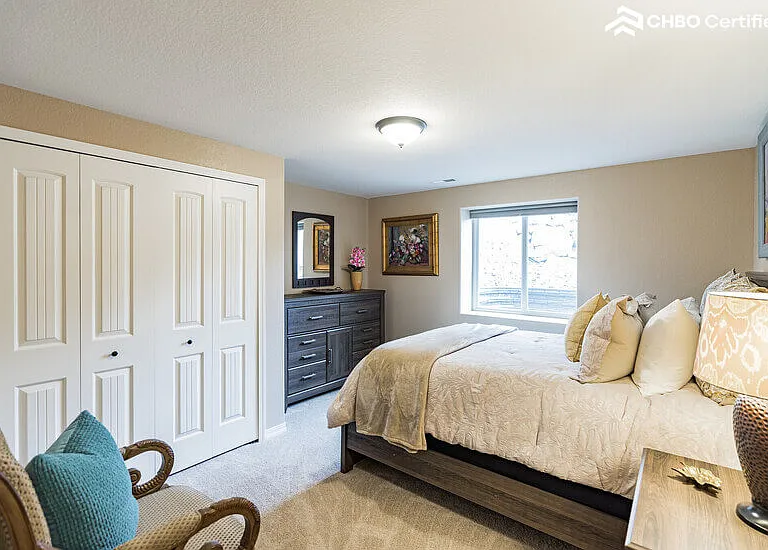 lower bedroom with queen
