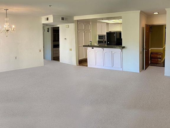 Living/Dining Room, Kitchen, Bathroom #1