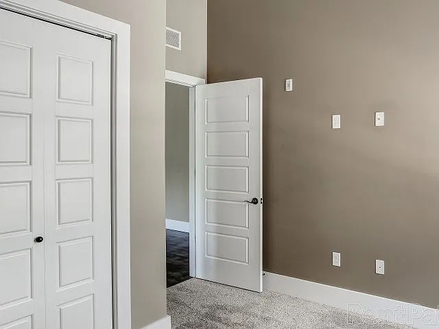Tall Ceiling With Custom Doors